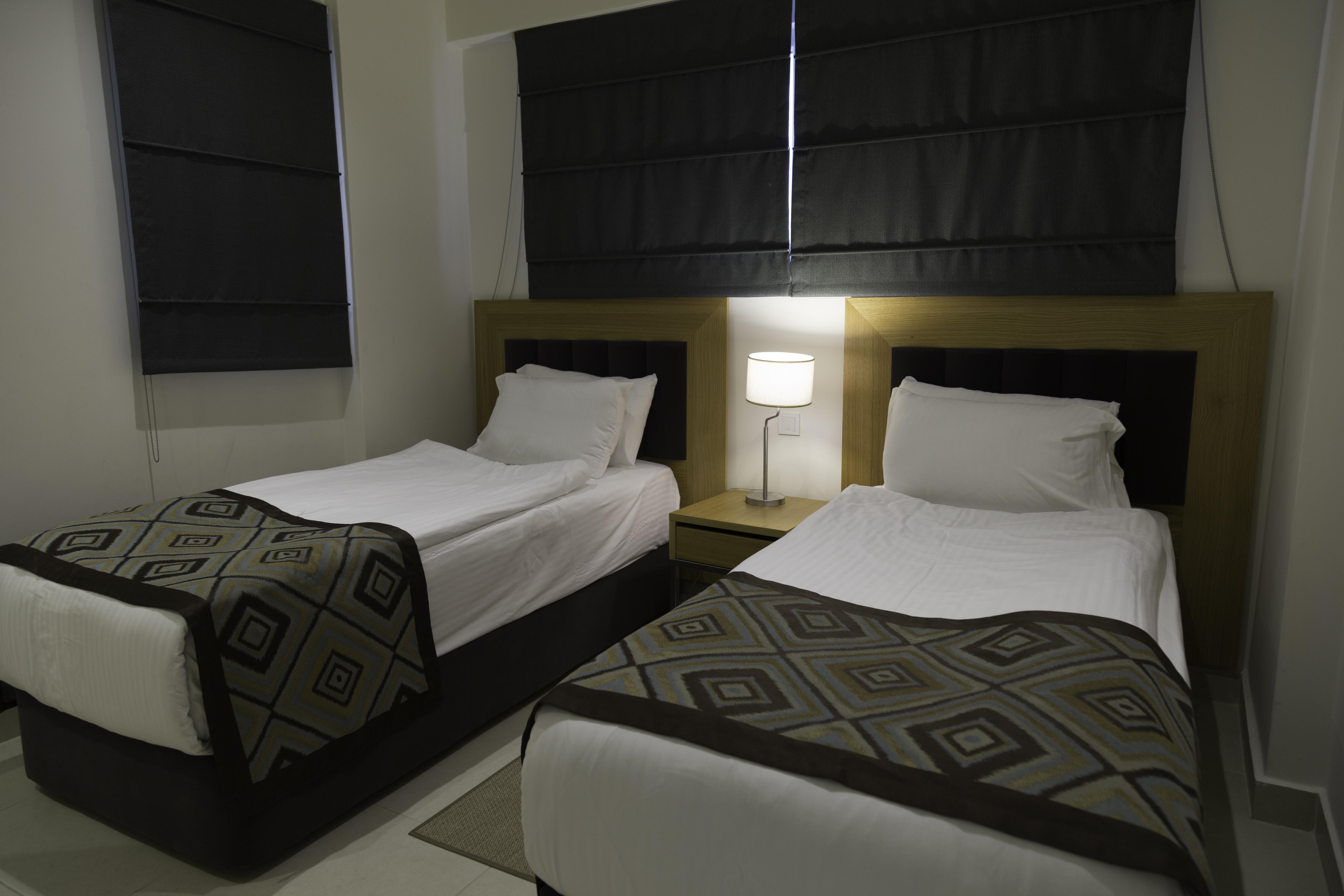 ラマダ リゾート クシャダス＆ゴルフ エクステリア 写真 A bedroom at the hotel